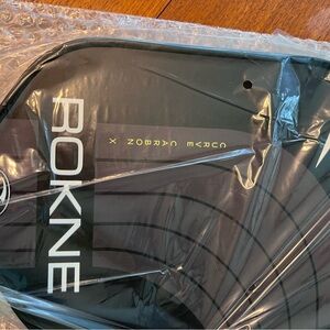 Rokne Curve Carbon X pickleball paddle.